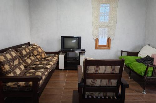 Casa em Capão Novo Grande com Churrasqueira Pátio Compartilhado 3 Vagas estacionamento