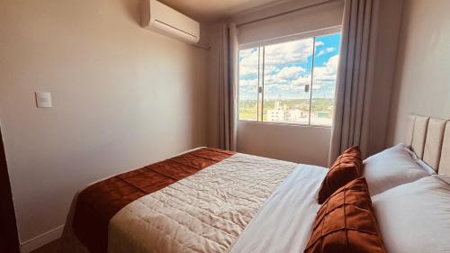 Apartamento com ar condicionado e lava e seca