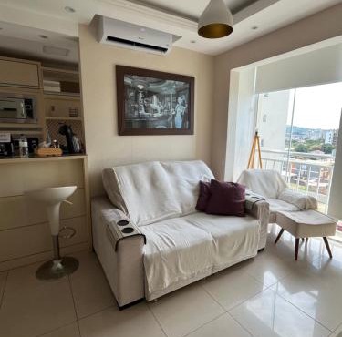Apartamento suíte com estacionamento