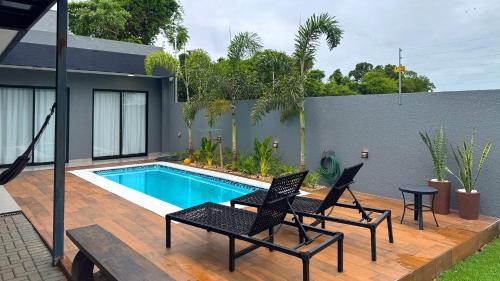Casa em Foz do Iguaçu com piscina, churrasqueira e ar-condicionado em todos os cômodos