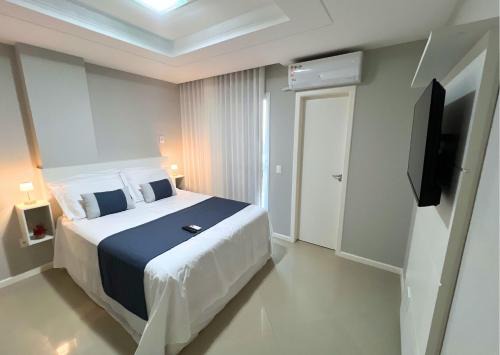 RefugioBacutia- Prédio FRENTE MAR Bacutia- 6 pessoas- 3 Quartos com AR sendo 1 suite - varanda- sala de estar e jantar Ampla -Piscina e Sauna no Prédio