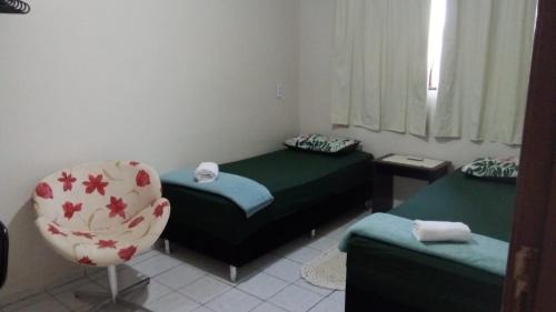 Apto 10: sala/cozinha,1quarto(ar e 2 camas)c/garag